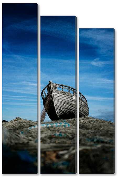 Модульная картина - Старая лодка на фоне неба